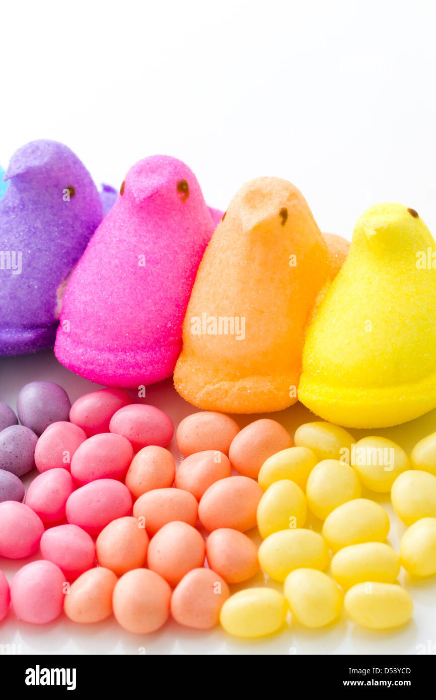 Rainbow color marshmallow peeps and jelly beans Stock Photo Alamy