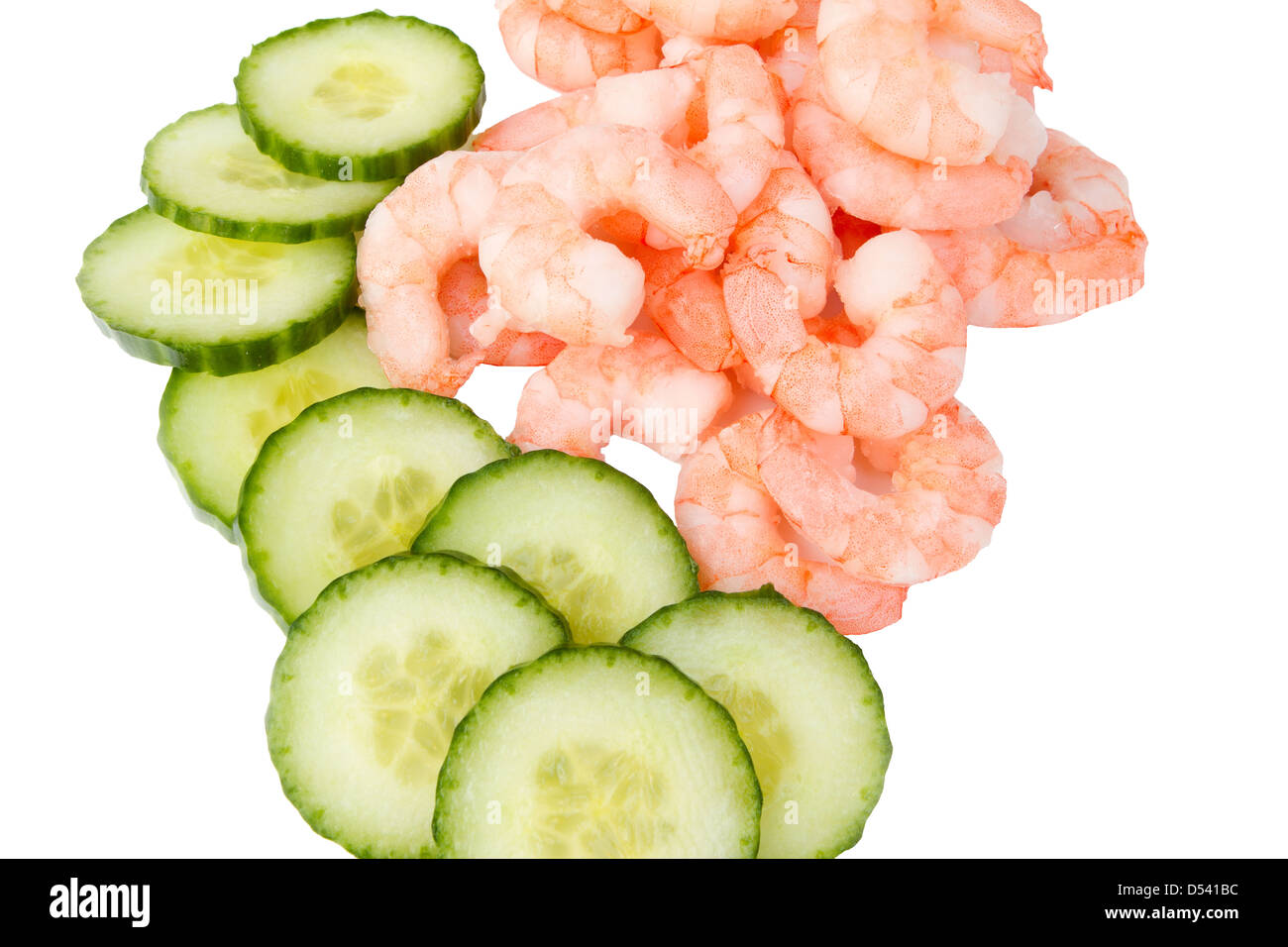Fresh parwns and sliced cucumber isolated Stock Photo