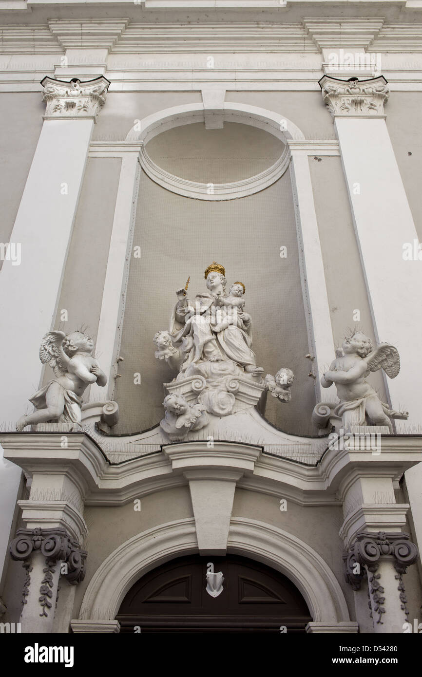 Religious sculptures on the exterior of St Michael 18th century church