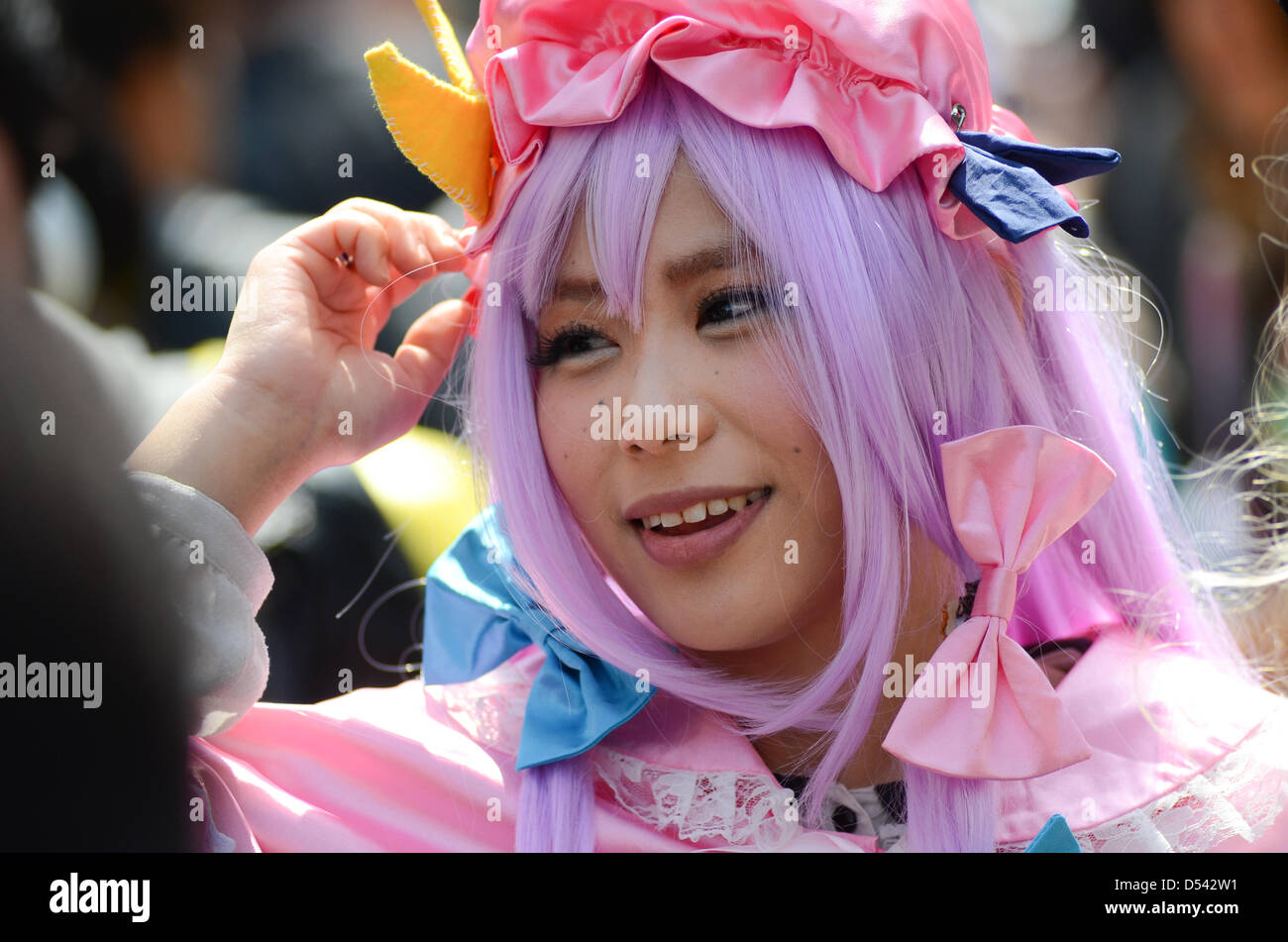 Osaka, Japan. 24th March, 2013. Thousands gather in the centre of Osaka on Sunday for the annual Nipponbashi Street Festa.The festa took place in Nipponbashi, Osaka's electronics district, more commonly known as Den-Den Town. Many streets were closed off to cater for the hordes of cosplay, manga and anime fans.Credit image: Trevor Mogg / Alamy Live News Stock Photo