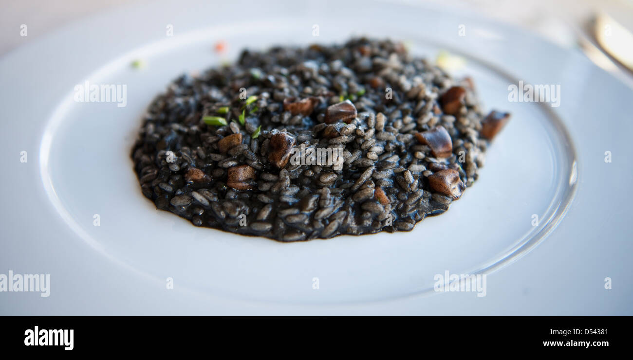 Squid ink and salmon risotto, Zadar Stock Photo