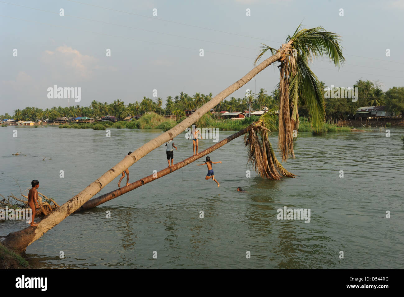 Children playing on river Mekong at Don Khon island on Laos Stock Photo