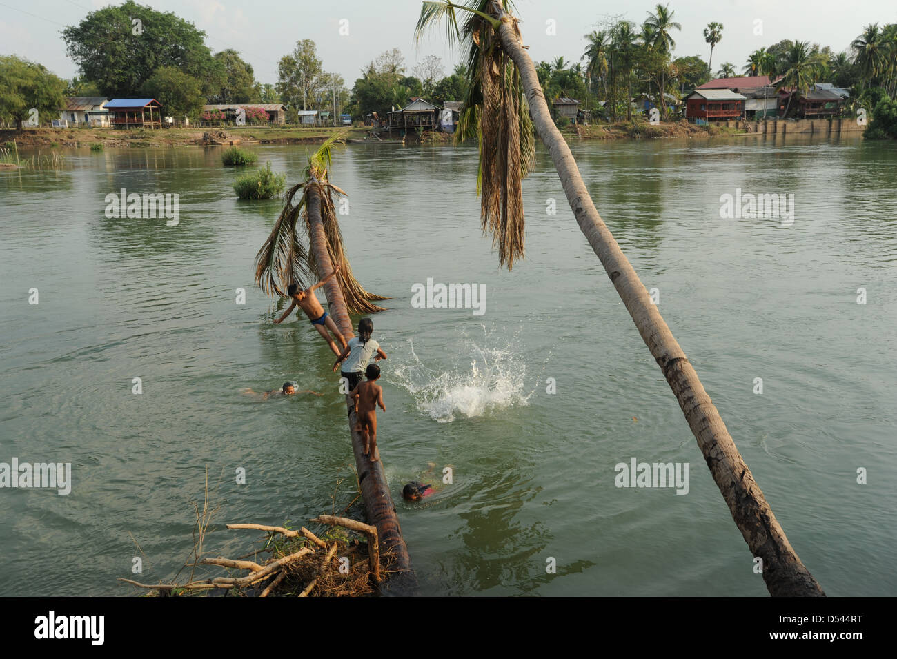 Children playing on river Mekong at Don Khon island on Laos Stock Photo