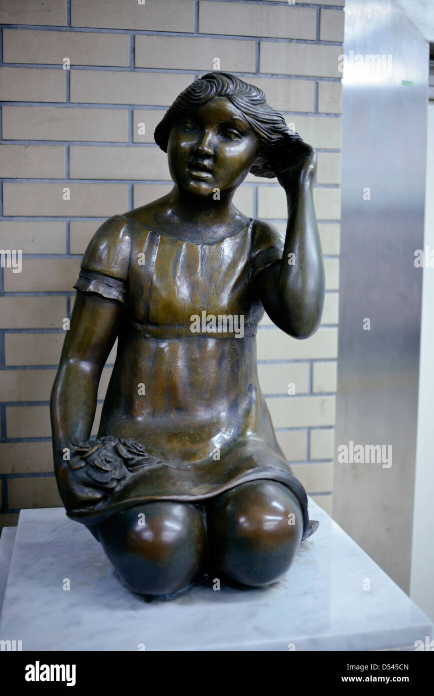 Girl sculpture at Hamamatsu-cho station,Tokyo Stock Photo