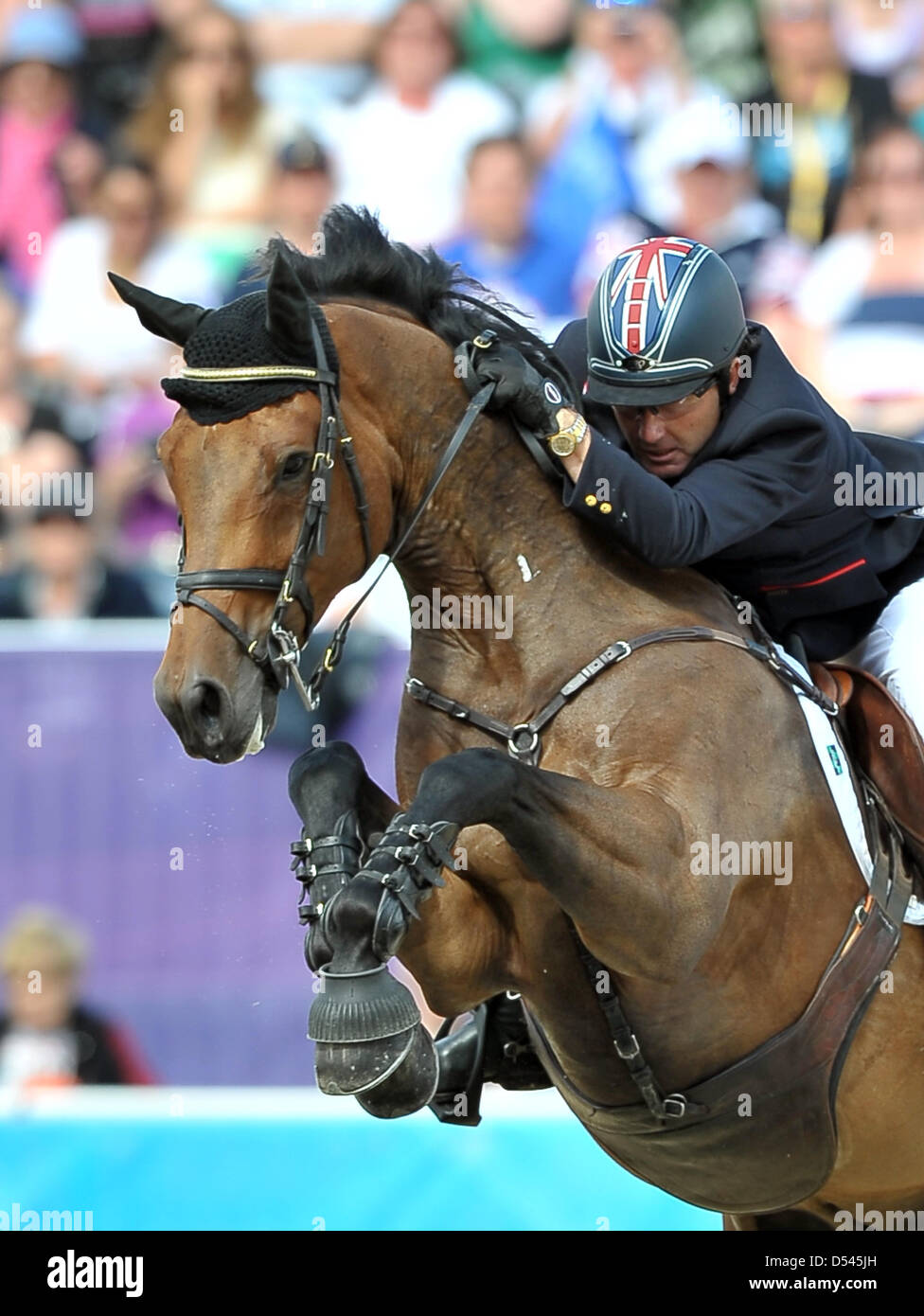Peter Ridings Peter Charles riding Vindicat (GBR, Great Britain). Team Showjumping ...