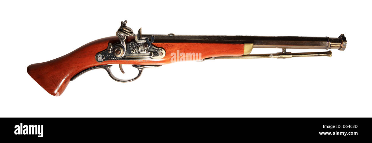 Model of the old gun on the white background, souvenir Stock Photo - Alamy