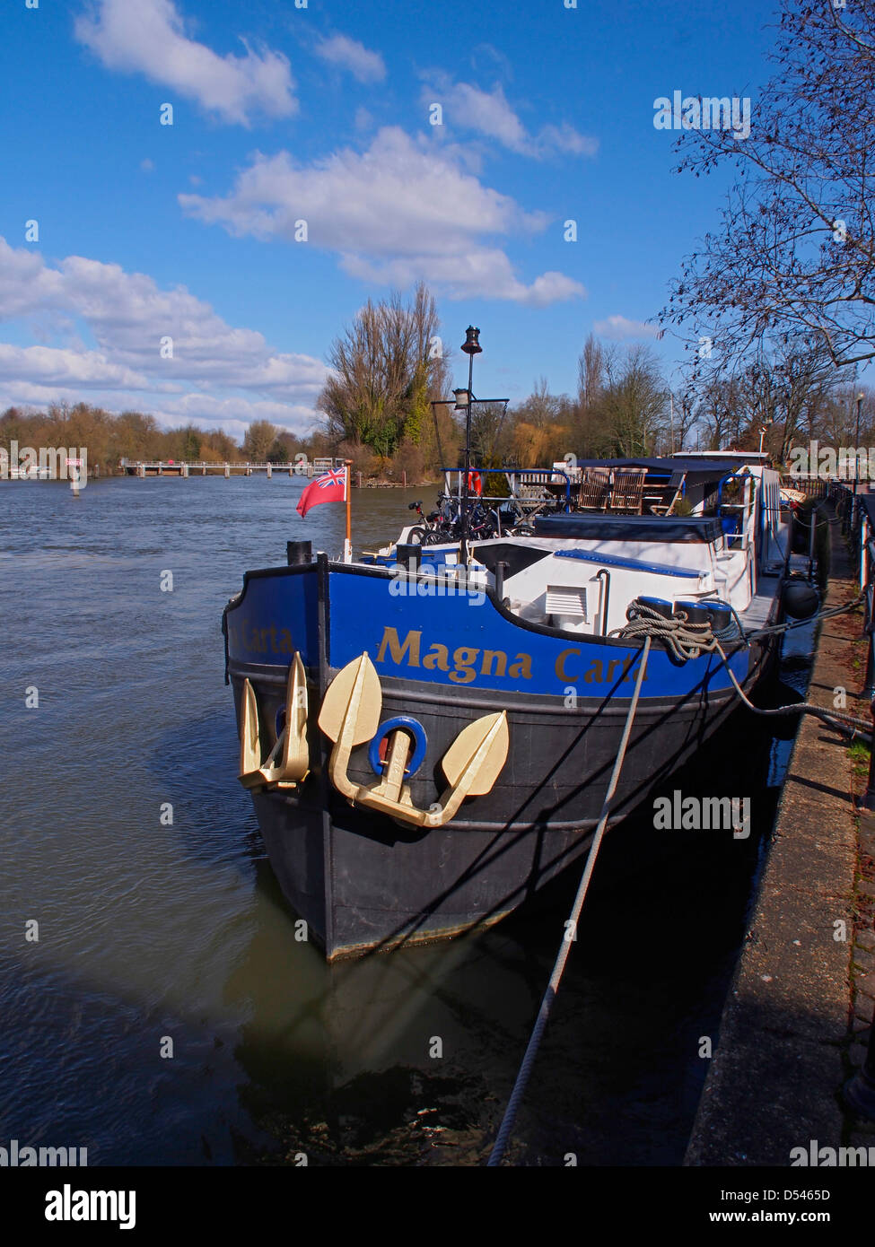 The Magna Carta boat on The River Thames moored by the bridge between Windsor and Eaton Stock Photo