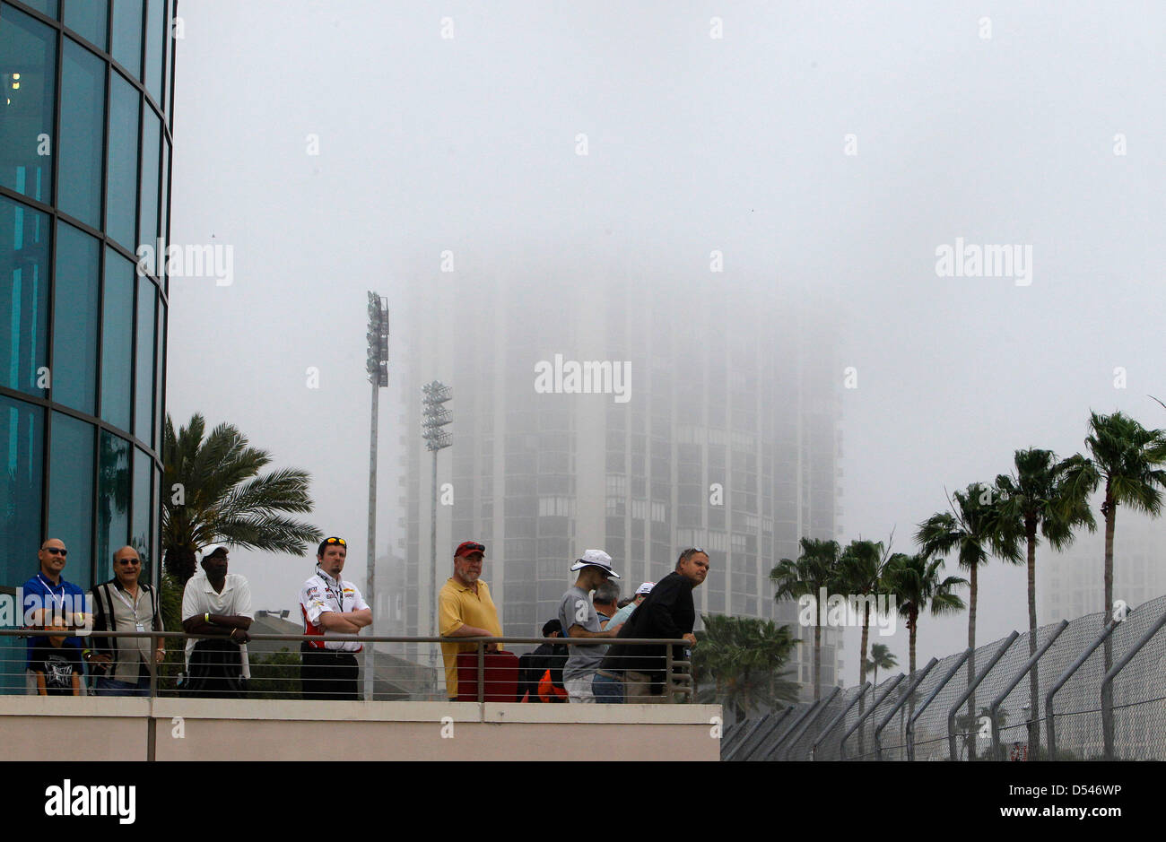 March 24, 2013 - St. Petersburg, Florida, U.S. - DIRK SHADD   |   Times  .Fog descends over the city on a gloomy morning as race fans watch during the IndyCar warm-ups at the Honda Grand Prix of St. Petersburg Sunday morning (03/24/13). The rainy forecast remains a concern as the starts time for the race approaches. (Credit Image: © Dirk Shadd/Tampa Bay Times/ZUMAPRESS.com) Stock Photo