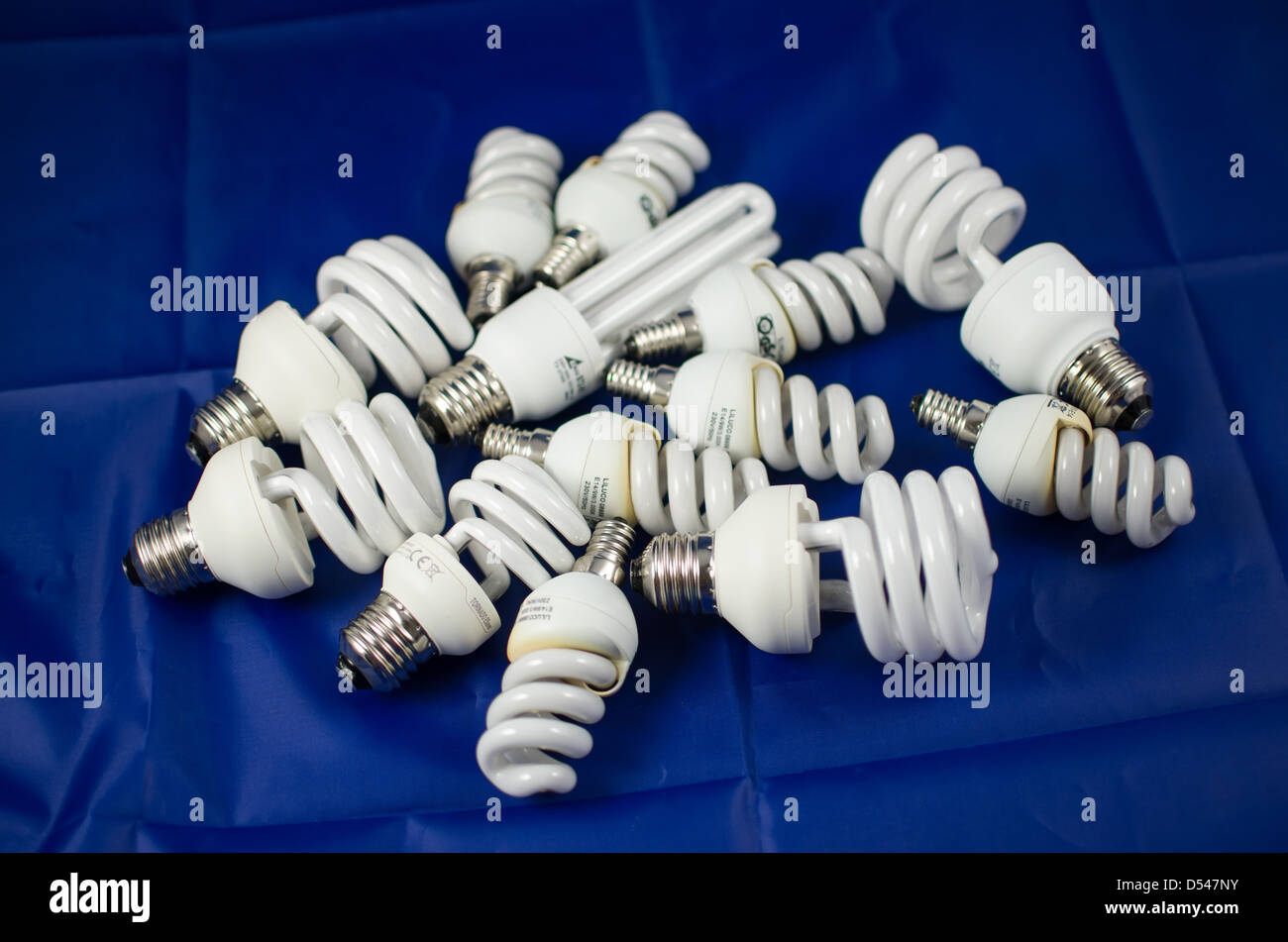 Pile Of White Energy Saving Light Bulbs Stock Photo - Alamy