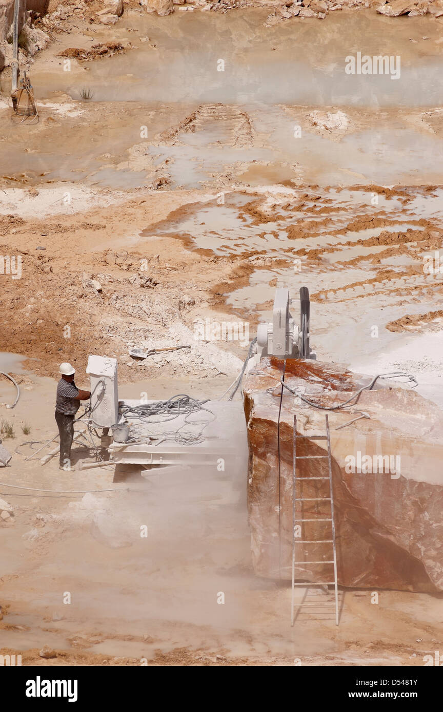 Marble Extraction Process Rock drilling machine marble hi-res stock photography and images - Alamy
