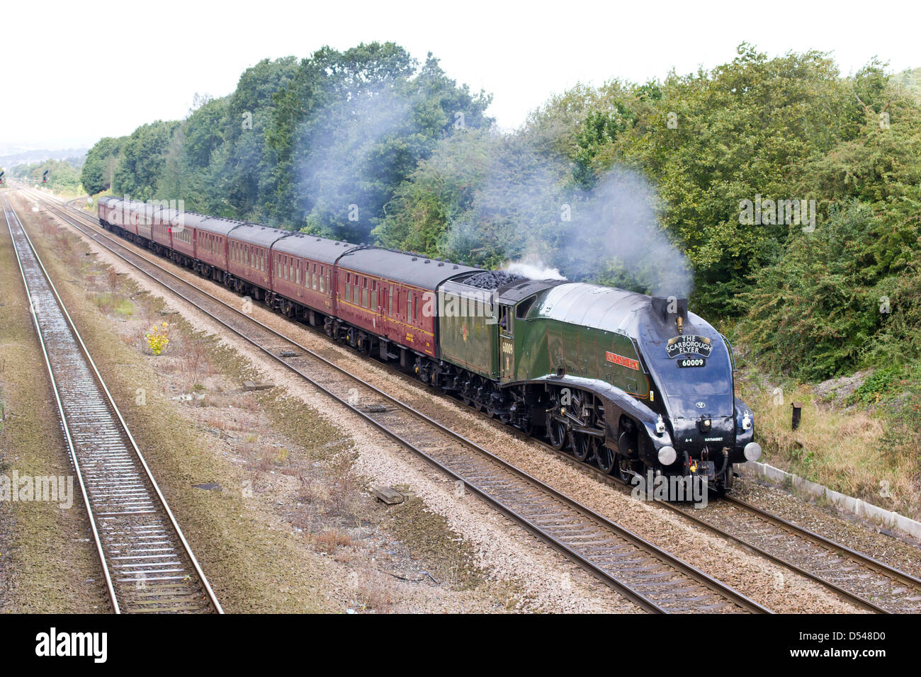 Steam train pulling passenger coaches hires stock photography and images Alamy