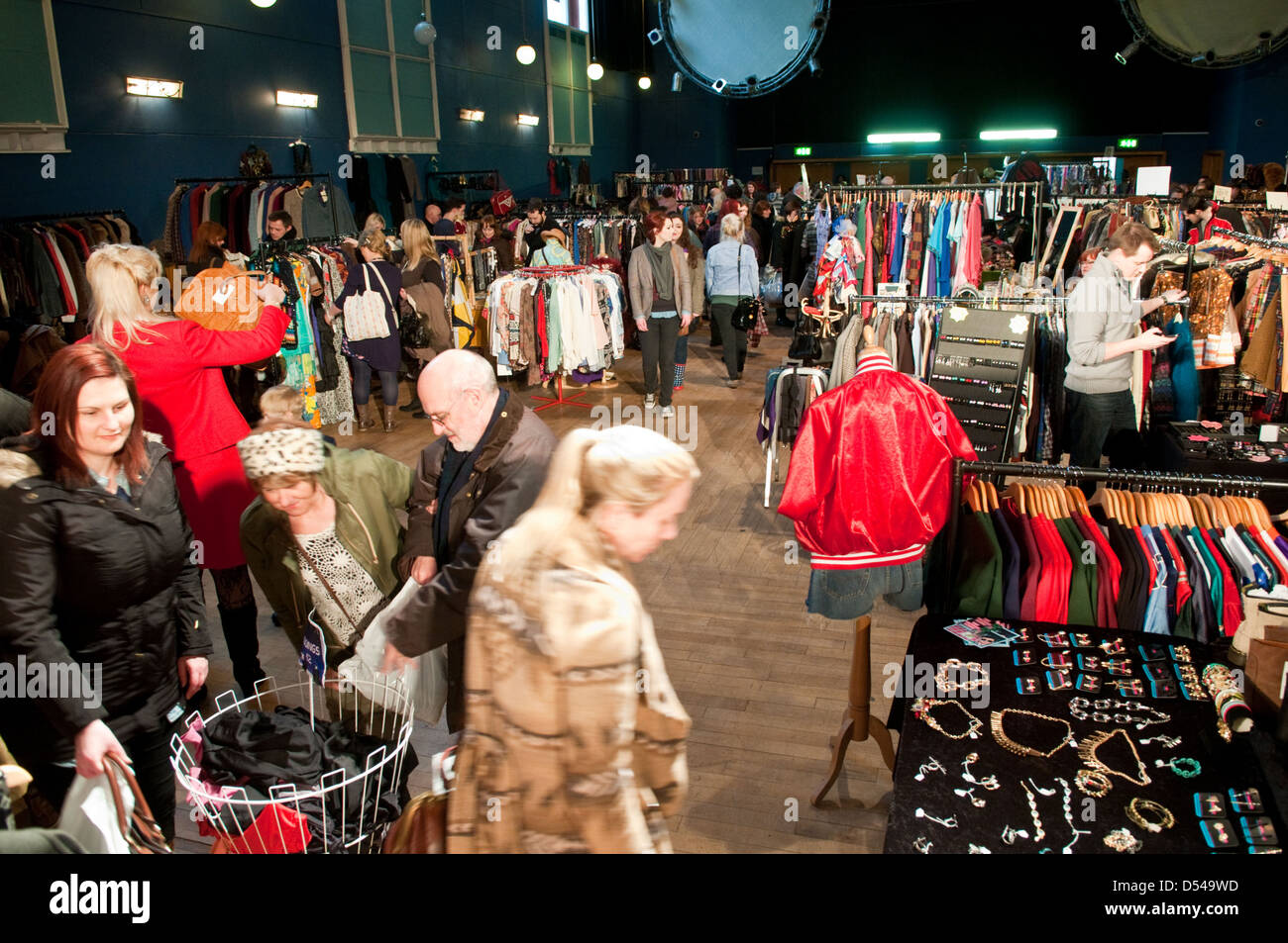 Shoppers browse rows of clothes hires stock photography and images Alamy