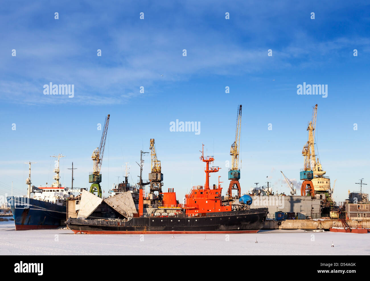 Ships and cranes in wharf of St.Petersburg, Russia Stock Photo