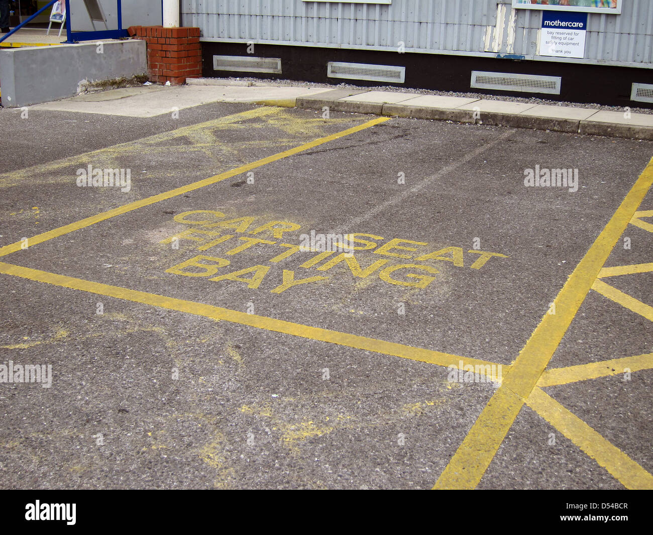 Car seat fitting bay outside a shop selling baby gear Stock Photo Alamy
