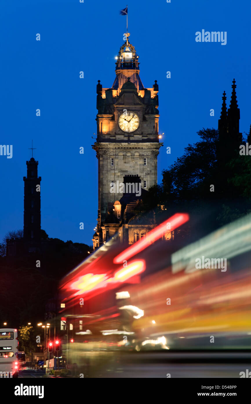 Balmoral Hotel Clock Tower and streaking bus, Edinburgh, Scotland, United Kingdom Stock Photo