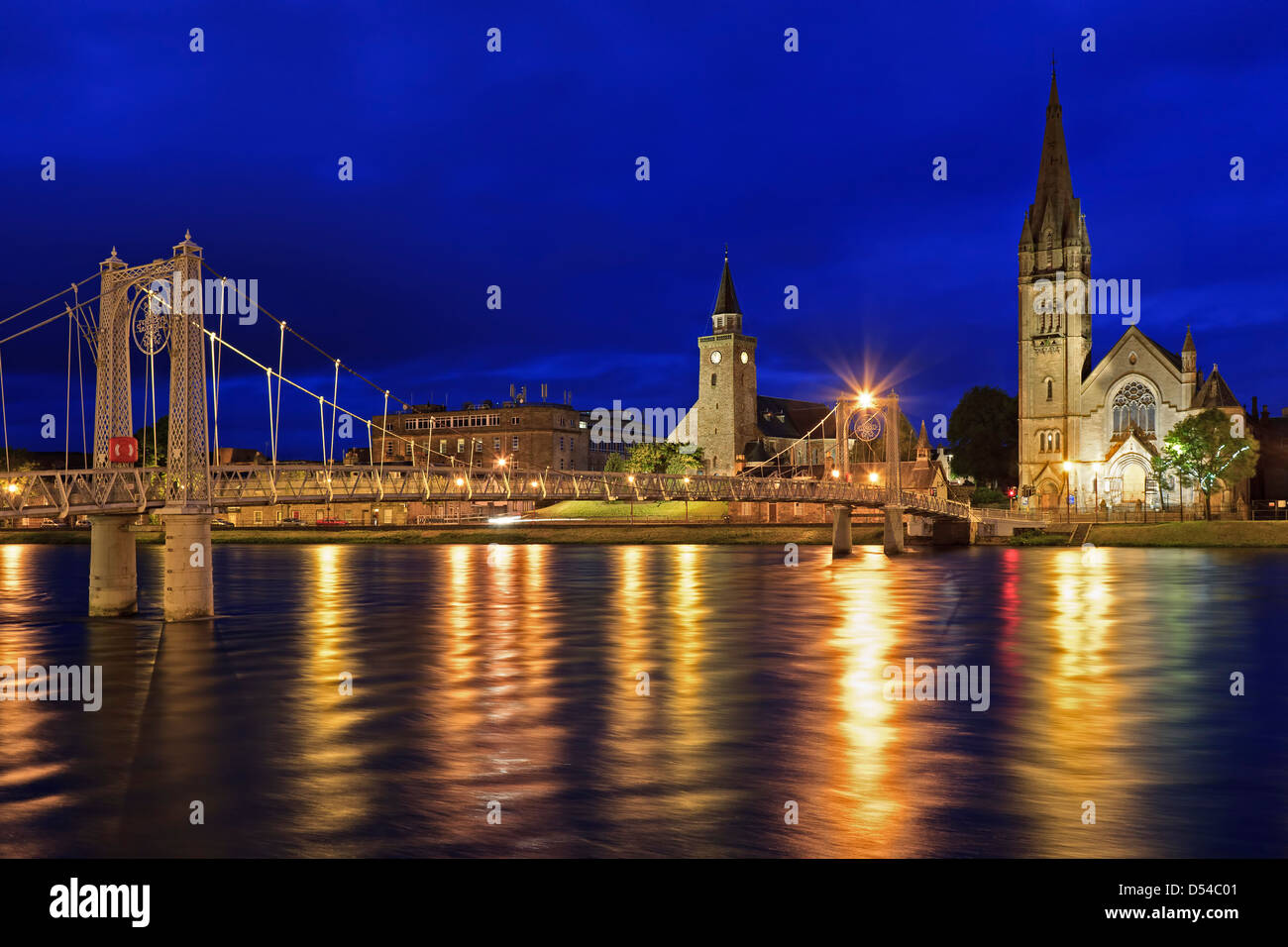 Footbridge over River Ness and churches, Inverness, Scotland, United Kingdom Stock Photo