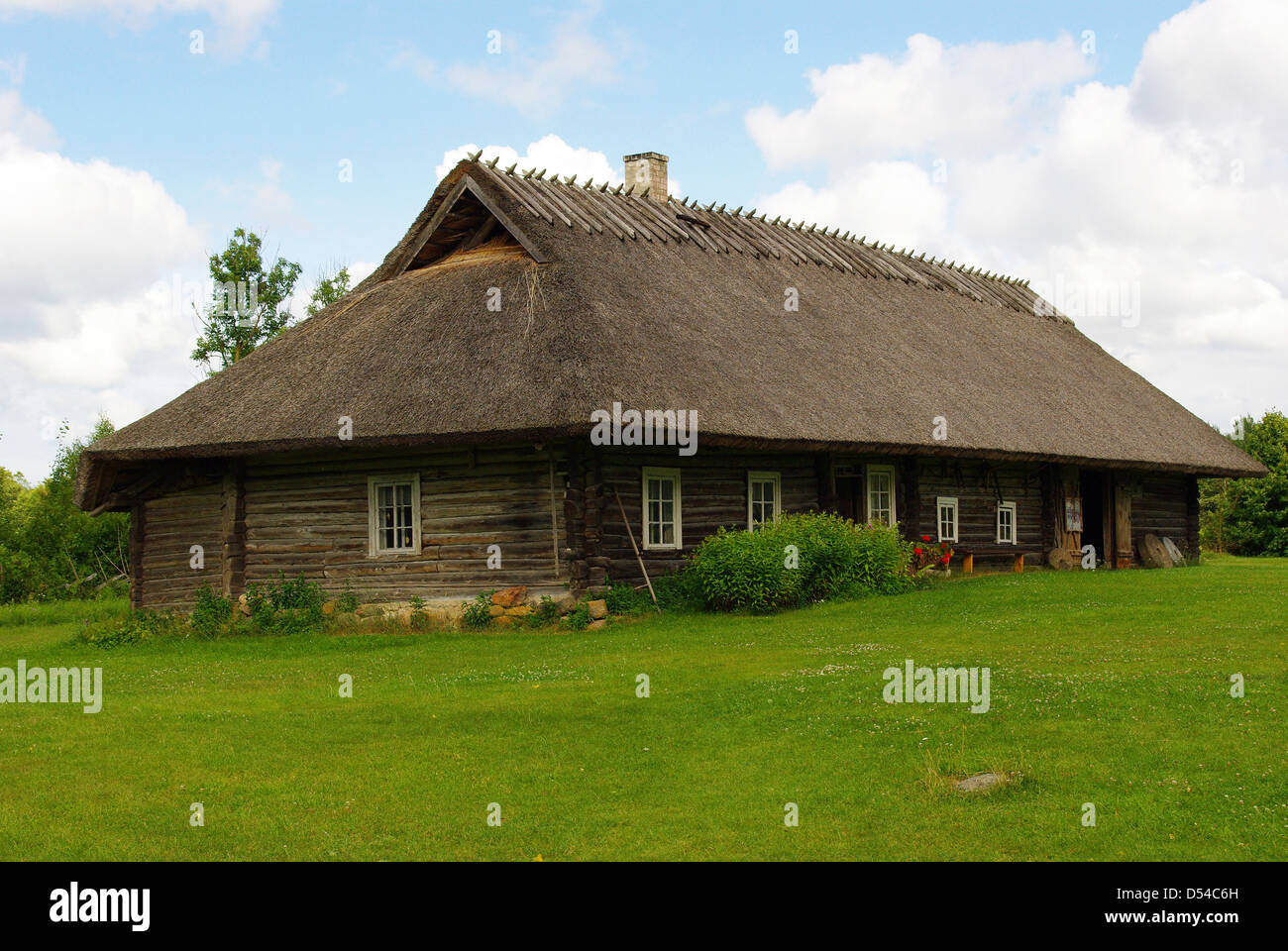 Old traditional log house / cottage in Estonia Stock Photo