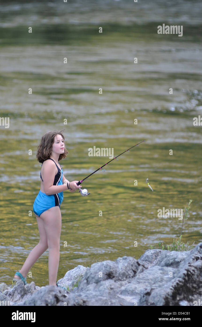 Girl fishing on Oregon's Rogue River. Stock Photo