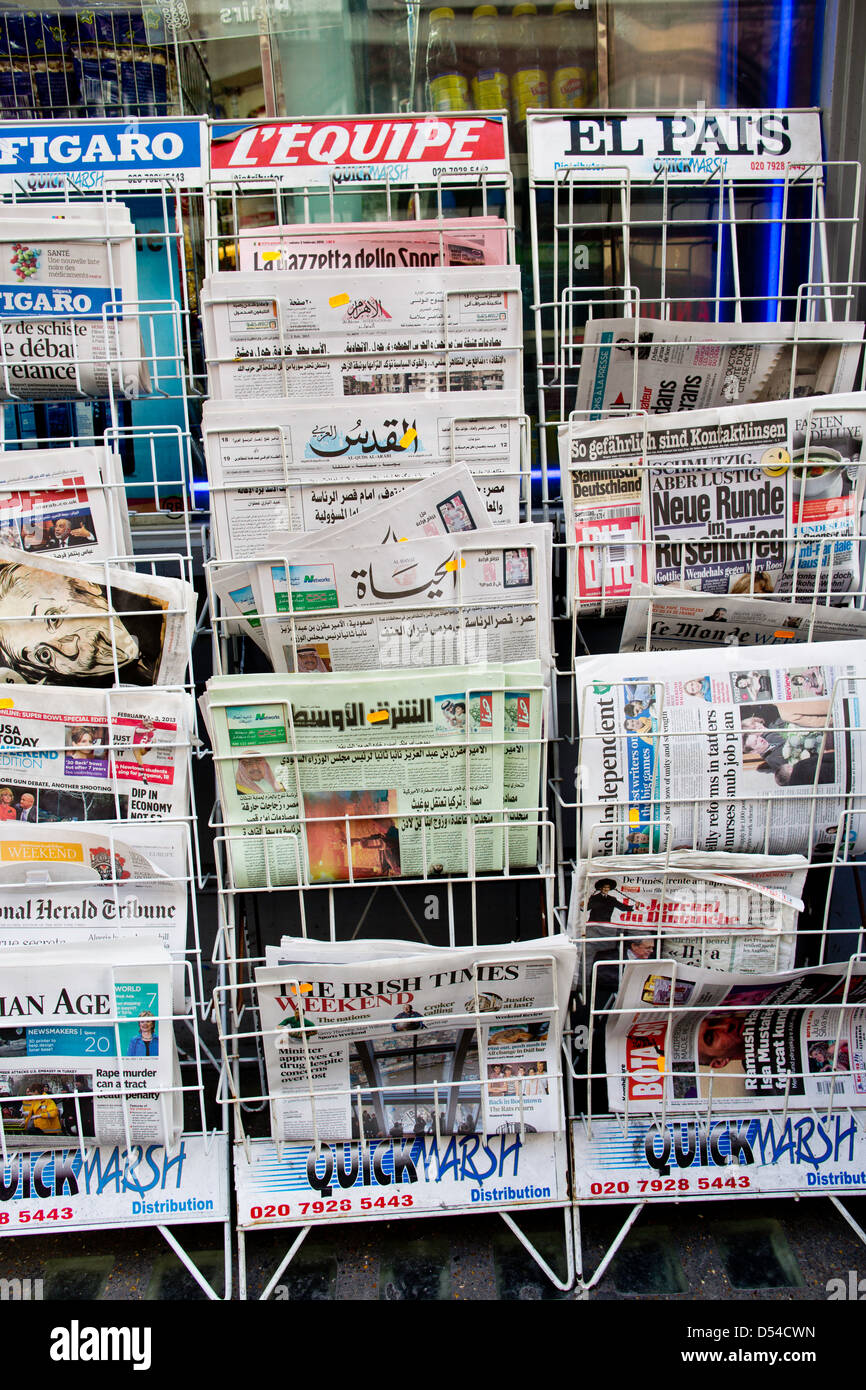 International newspapers on sale, London, United Kingdom Stock Photo