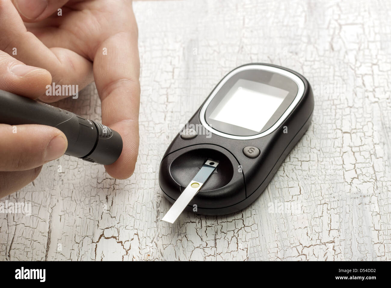 Man Testing His Blood Sugar With Stock Photo Alamy
