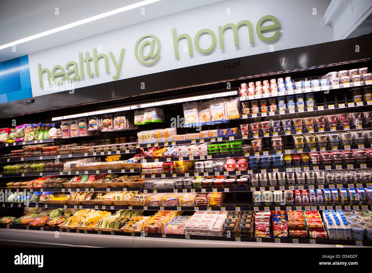 Yogurt, cheese, produce and other grocery items on display at a