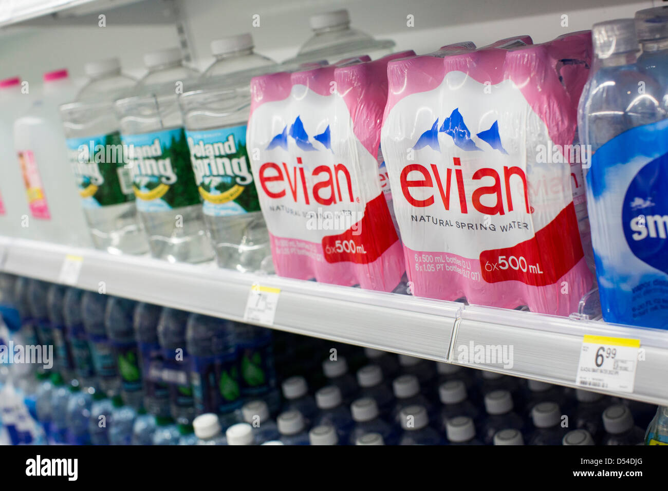 Evian and Poland Spring bottled water on display at a Walgreens Flagship store. Stock Photo