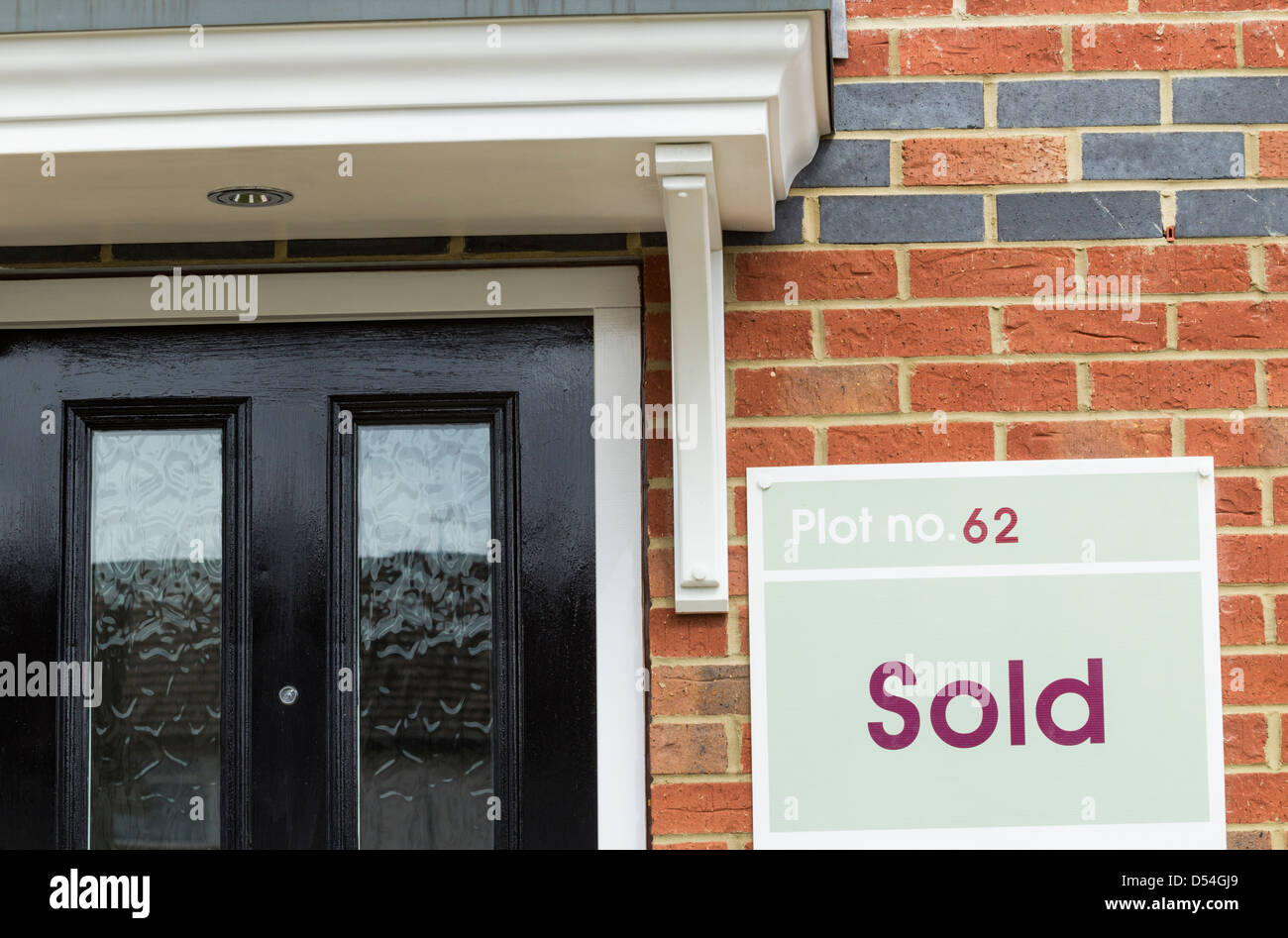 Sold sign on newly built house in north east England, UK Stock Photo