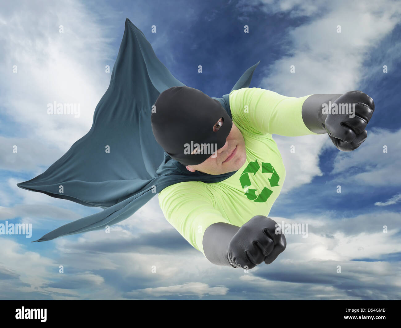 Eco friendly green superhero flying in the air Stock Photo