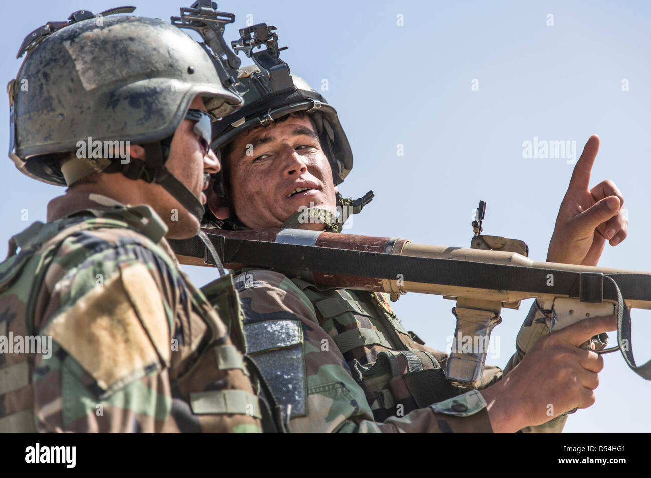 Afghan commandos from Special Operations Kandak prepare to fire a