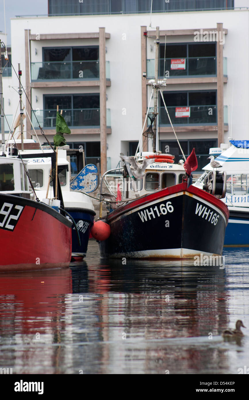 Fishing boats in West Bay, Dorset Stock Photo - Alamy