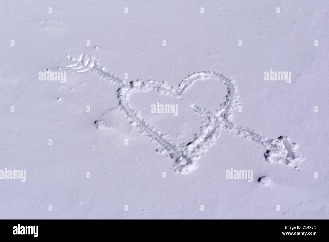 Love hearts drawn in the snow Stock Photo