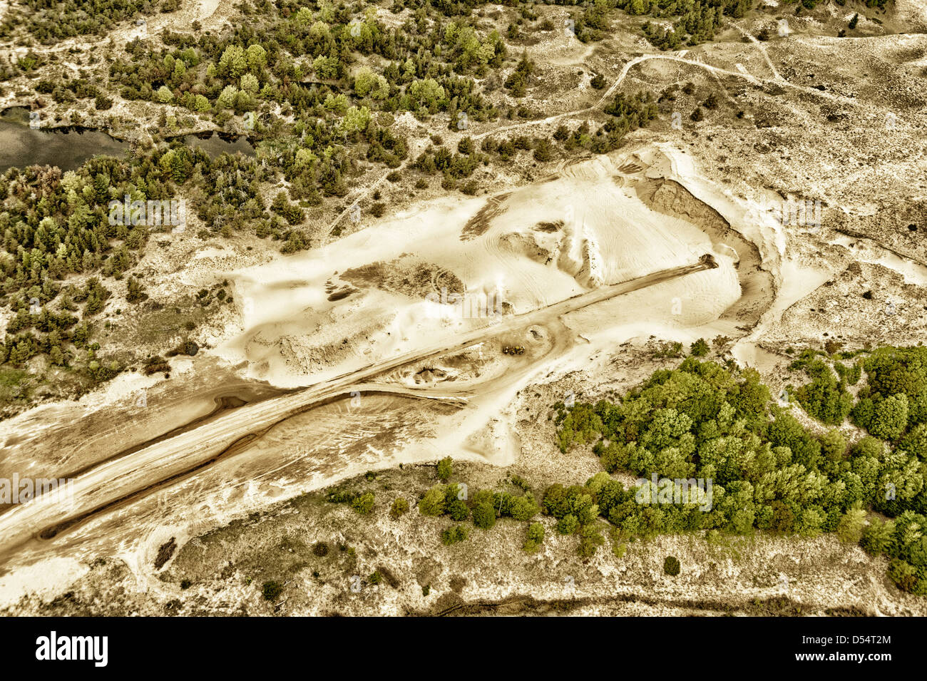 Aerial view of sand mining operation adjacent to Ludington Dunes State Park near Ludington, Michigan, USA. Photography by Jeffrey Wickett, NorthLight Stock Photo