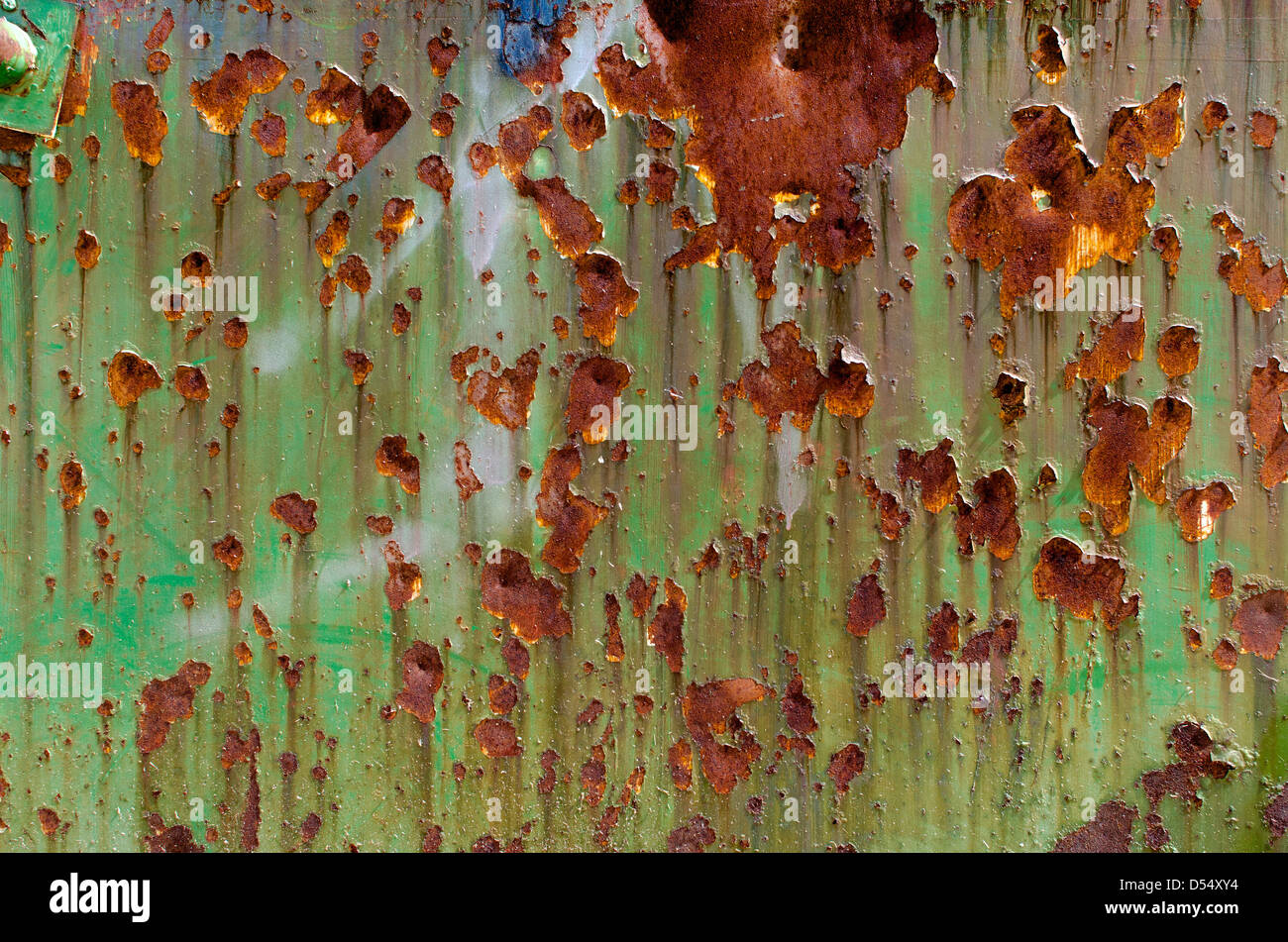 Sheet metal, painted green, with signs of rust. Background Stock Photo