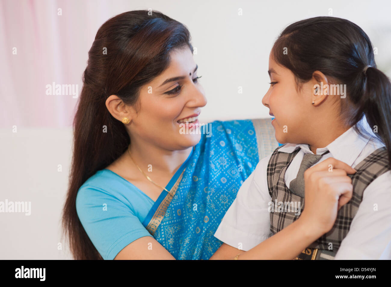 Child school uniform adult home hi-res stock photography and images - Alamy
