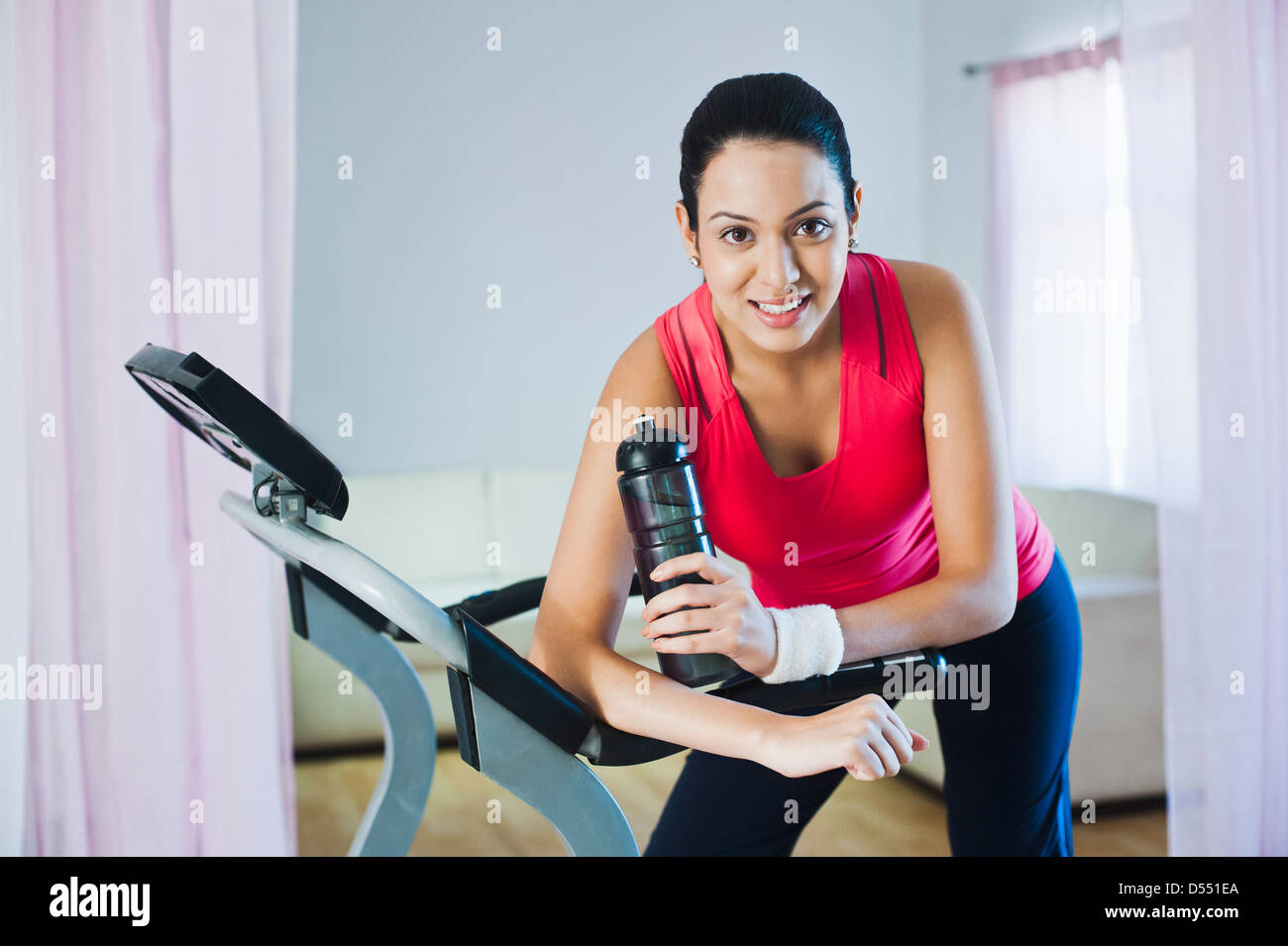 Indian young woman treadmill hi-res stock photography and images - Alamy