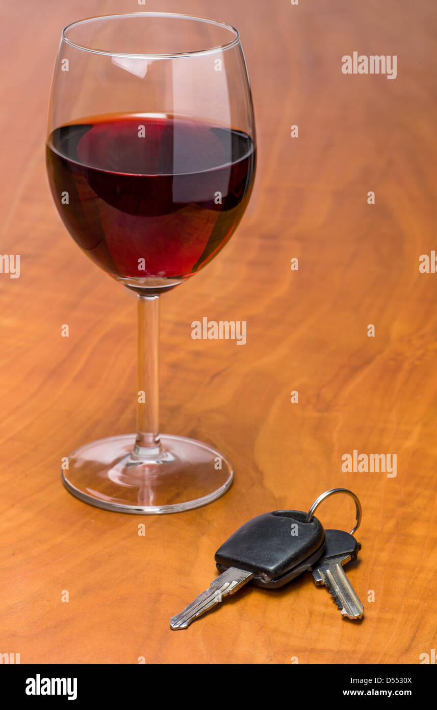 Red wine glass with car keys Stock Photo Alamy