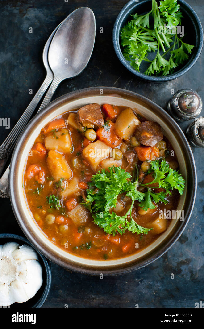 Bowl of stew with herbs Stock Photo