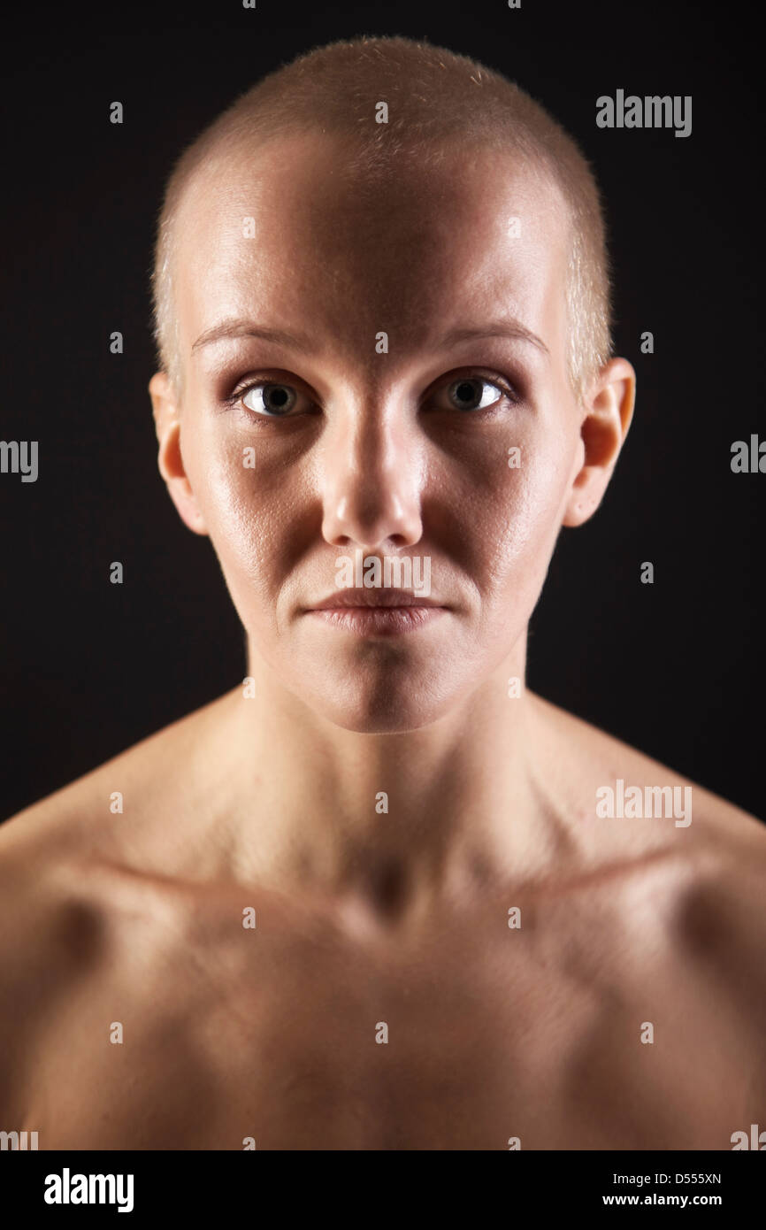 Nude woman with shaved head Stock Photo - Alamy