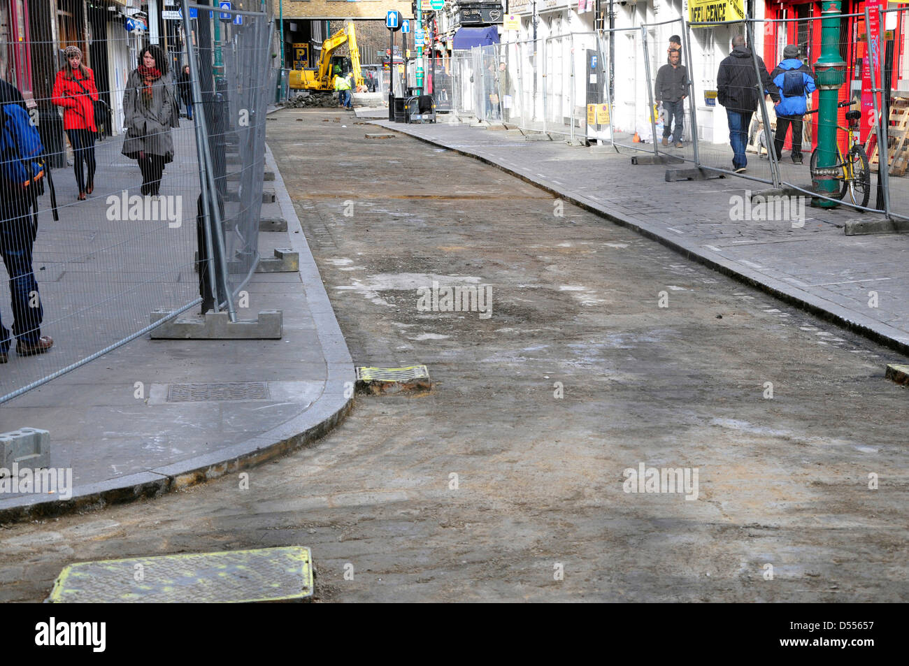 The famous cobbles in Brick Lane are removed and will be replaced with tarmac, London, UK Stock Photo