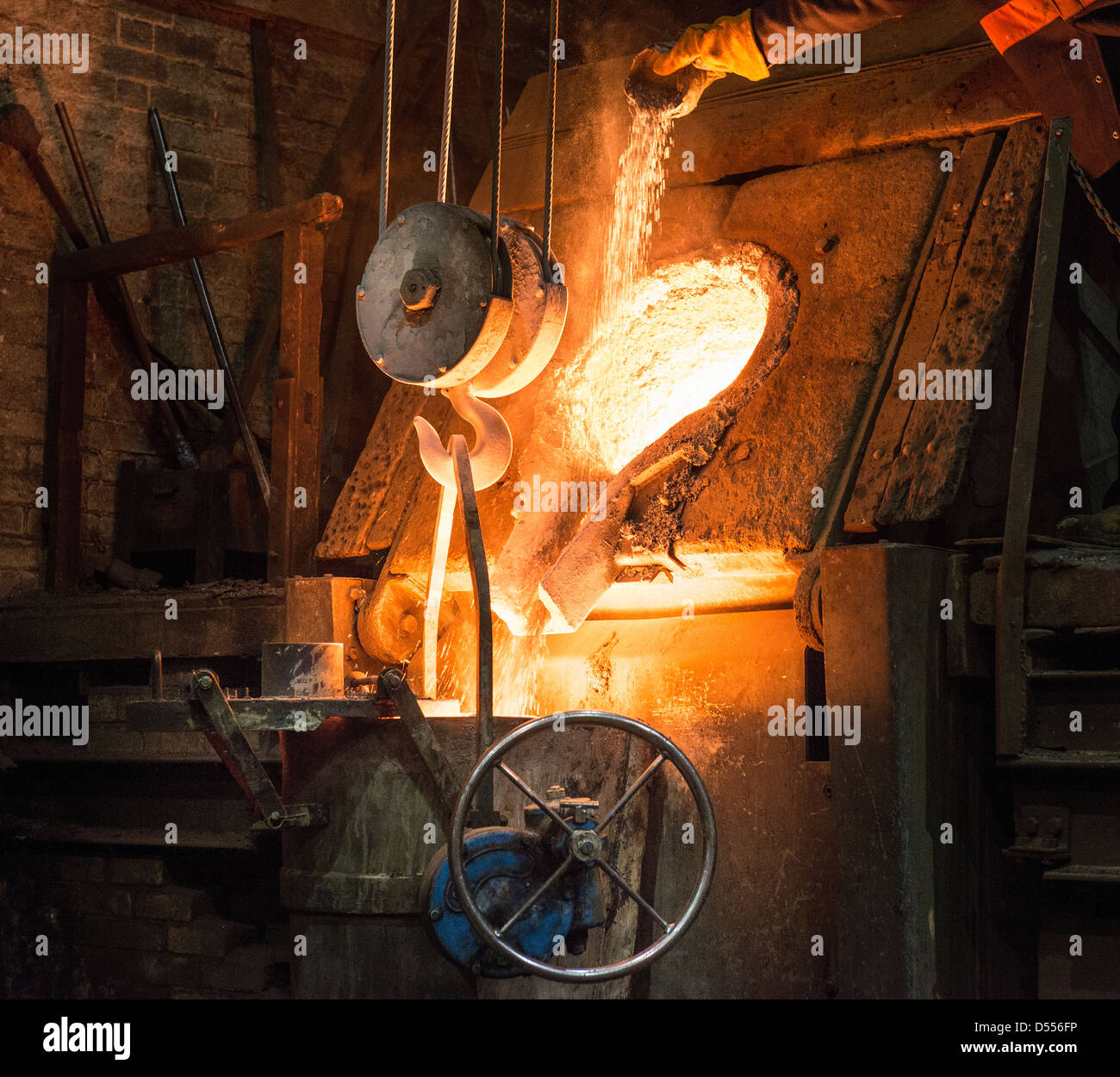 Molten metal pouring in foundry Stock Photo