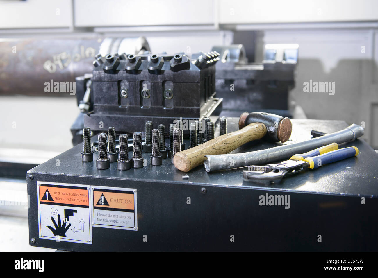 Nuts and bolts on industrial lathe Stock Photo