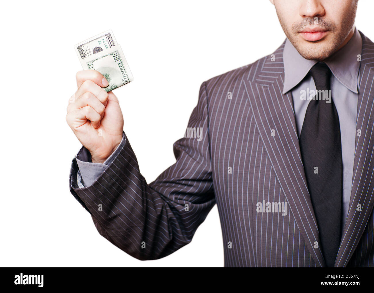 cheerful caucasian young businessman in gray suit holding money isolated on white background Stock Photo
