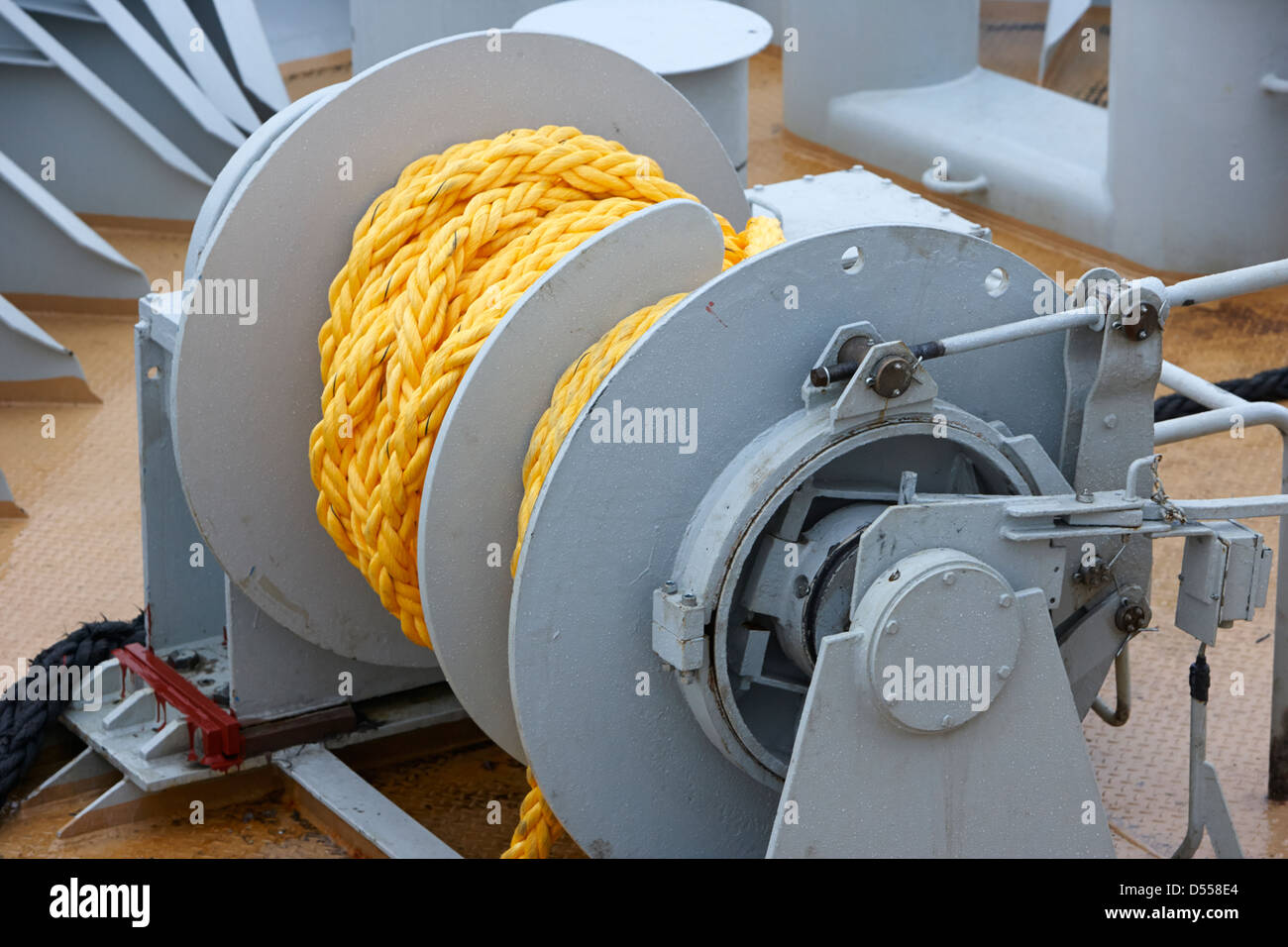 ships tying up ropes on reel on bow of ship Stock Photo Alamy
