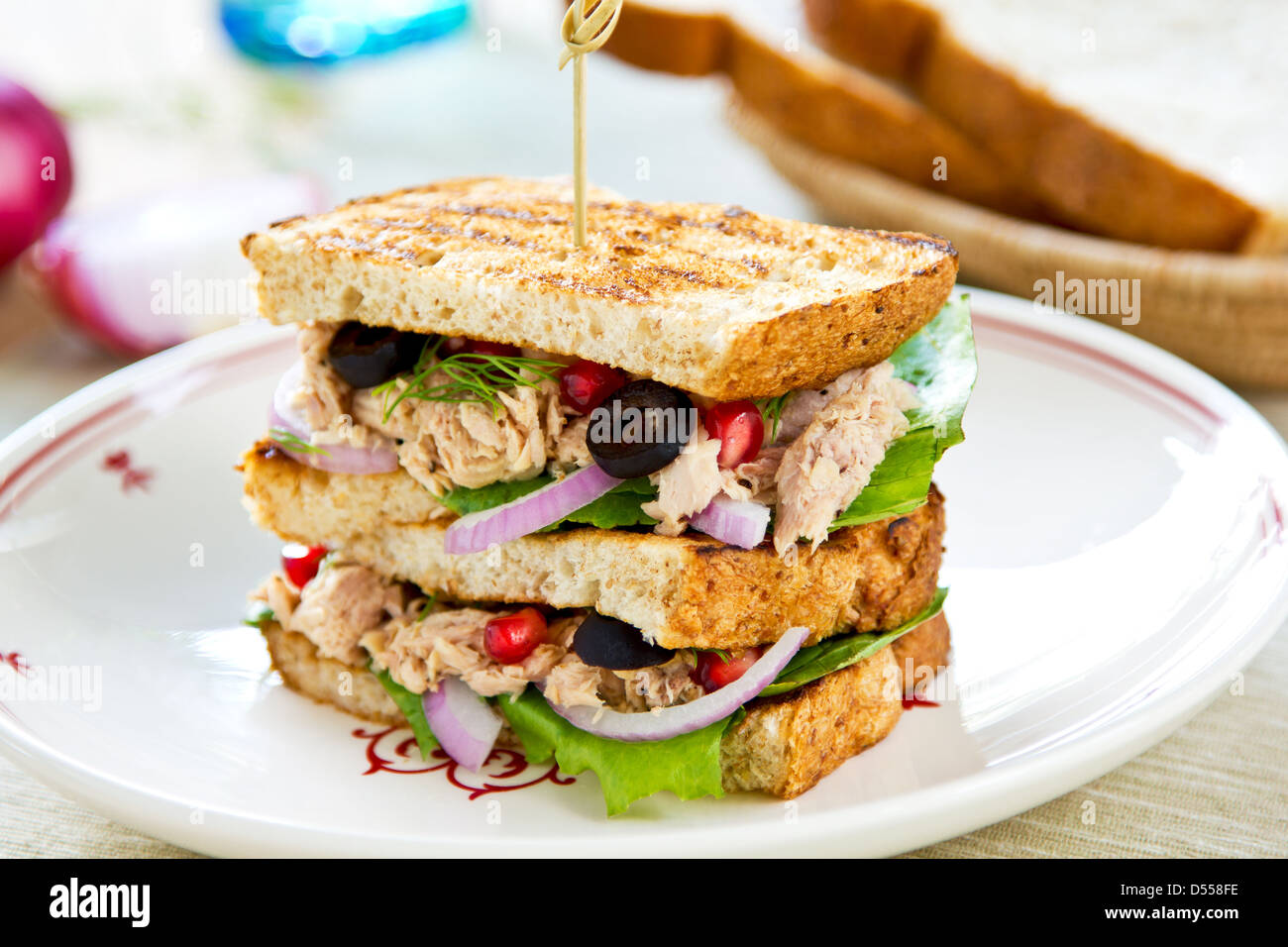 Tuna sandwich with olive and pomegranate Stock Photo Alamy