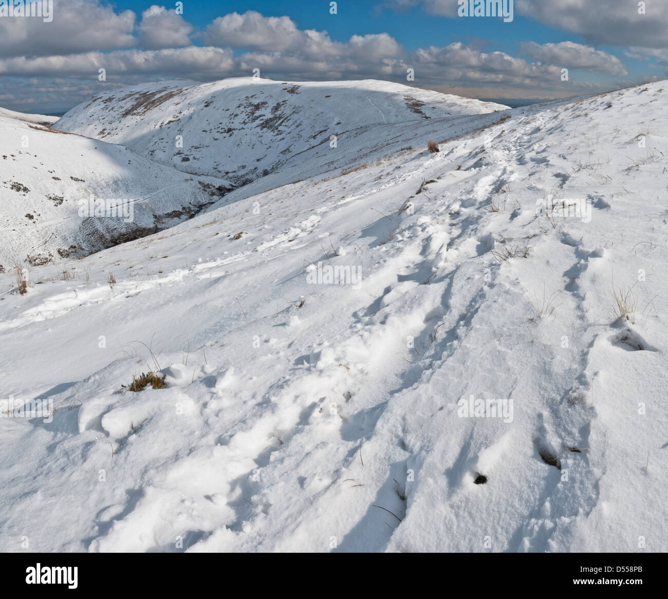 Looking towards Souter Fell covered in snow in winter, from Scales Fell, Blencathra, Lake District, Cumbria Stock Photo