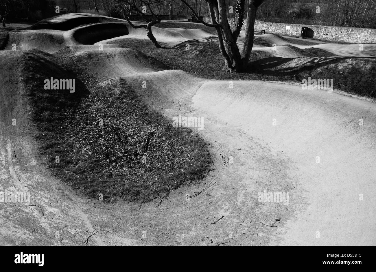 BMX track, curves and jumps. showing the organic shapes with light and shadow. Stock Photo