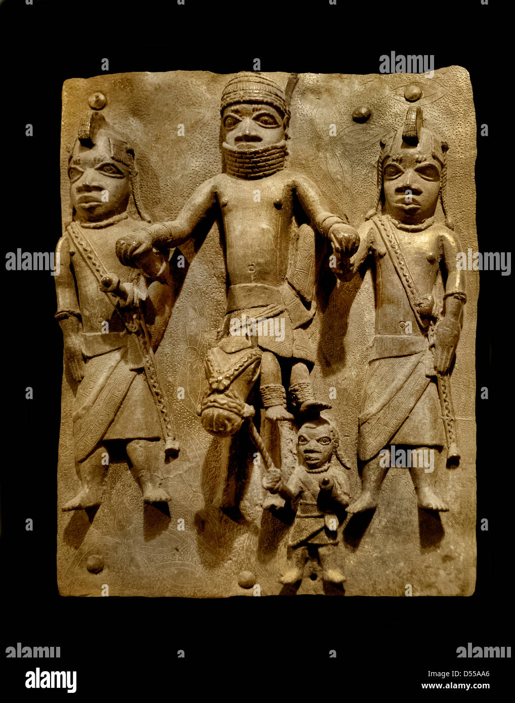 Bronze Brass plaque showing the Oba of Benin with attendants Edo