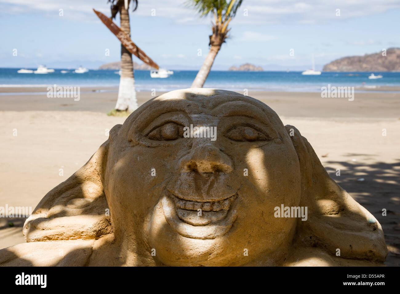 Stone sculpture on the beach at Playas del Coco, Guanacaste Province, Costa Rica. Stock Photo