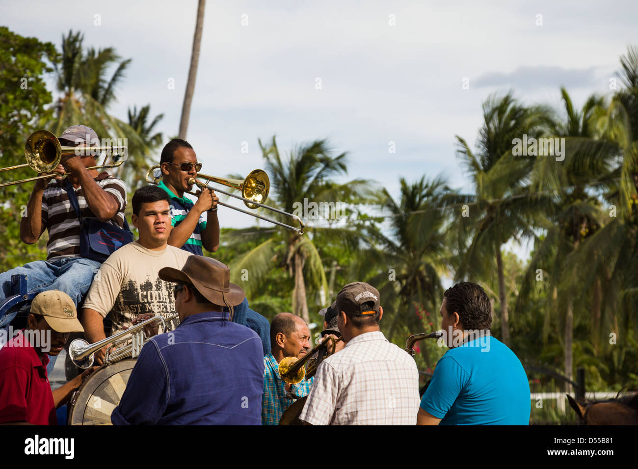 Band playing in the back of a pickup truck during the Tope de Caballos at Playas del Coco, Guanacaste Province, Costa Rica. Stock Photo