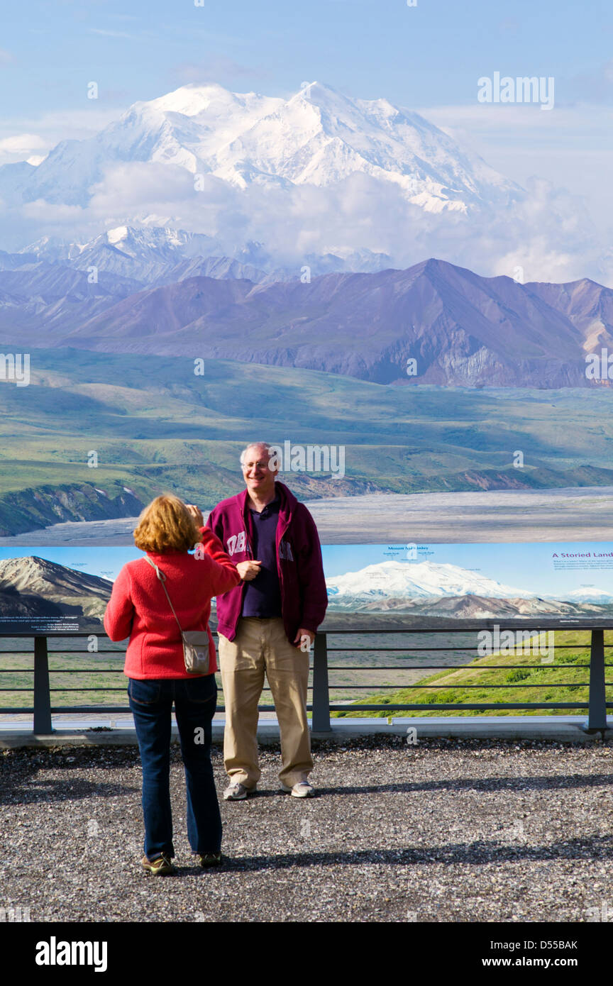 Tourists view Mt. McKinley (Denali Mountain), highest point in North America (20,320') from Eielson Visitor Center, Denali AK Stock Photo